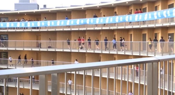 Thousands of people race to the top of the iconic ‘Vortex’ building in Switzerland | CNN