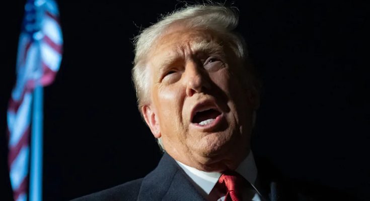 Critics say that when Johnson's lips move, it's increasingly Trump's voice that comes out. / Saul Loeb/AFP via Getty Images