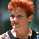 pauline-hanson-presser-one-nation-senator-pauline-hanson-arrives-to-speak-to-the-media-during-a-pres.webp