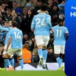 Nico O'Reilly  celebrates with his Man City team-mates after scoring their third goal against Bournemouth in their Premier League match